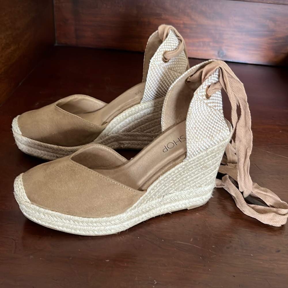 High-heel closed-toe light brown suede lace-up espadrilles from Spain.